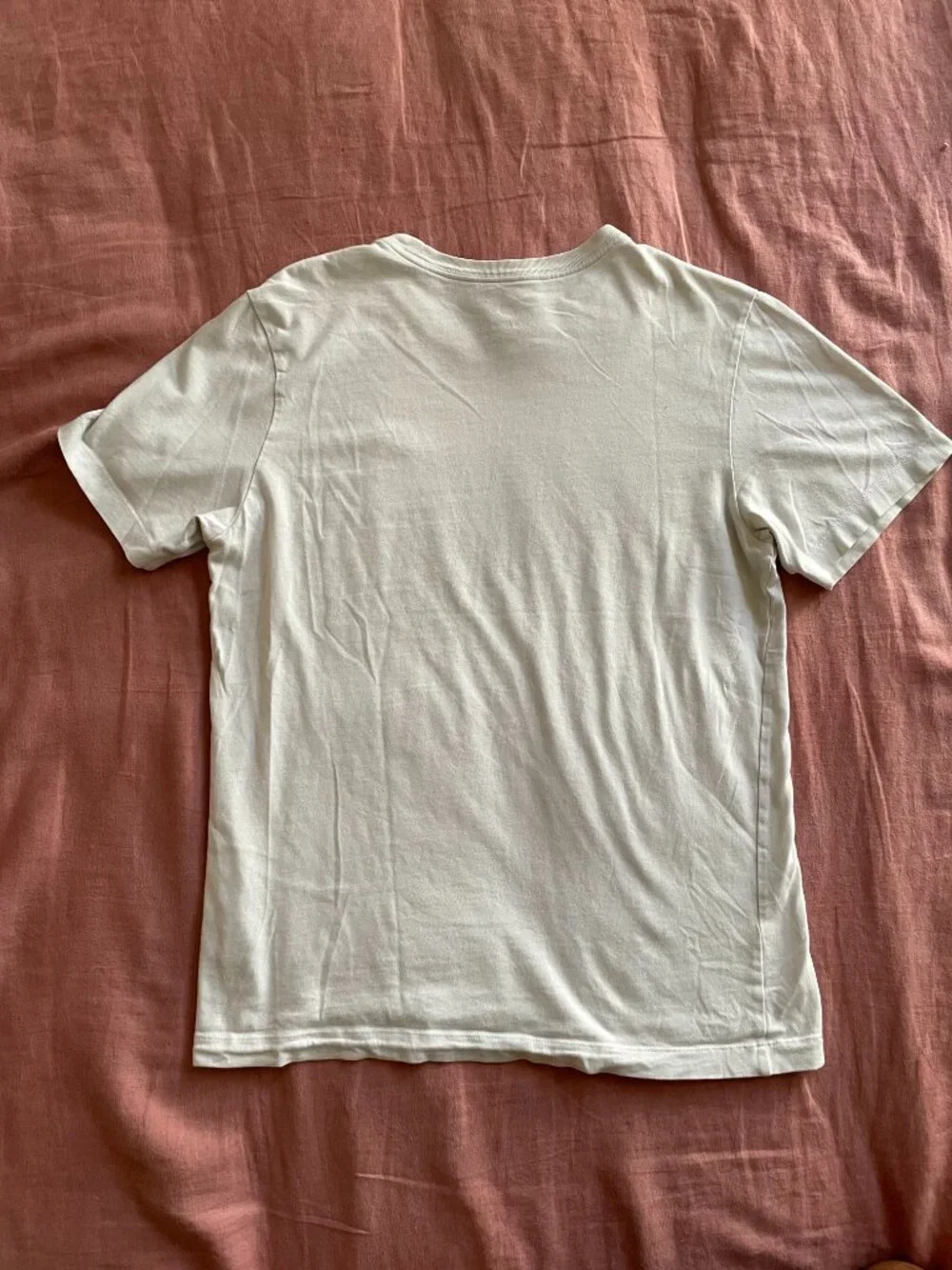 The Nike Tee With Two Red and Black Embroidered Logo - Size S